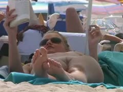 Sexy pale skin whore caught reading book on stripped beach all in nature's garb 